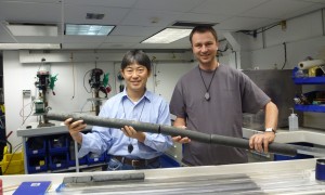 Co-chief Sano-san and Anthony Koppers hold one piece of cored Shatsky Rise basalt